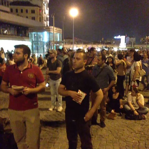 Hundreds of People standing on Taksim right now, silently. #occupygezi #duranadam